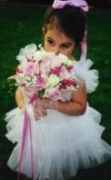 Renee's Daughter Holding A Flower Girl Bouquet