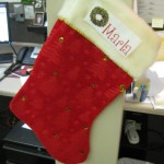 Marla's Stocking - All of our sales team has stockings hanging from their cubies!