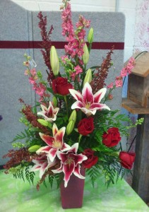 Red flower arrangement by Cottage Flowers, Pasadena TX