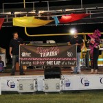 FSN team presenting our banner and spirit stick to the crowd