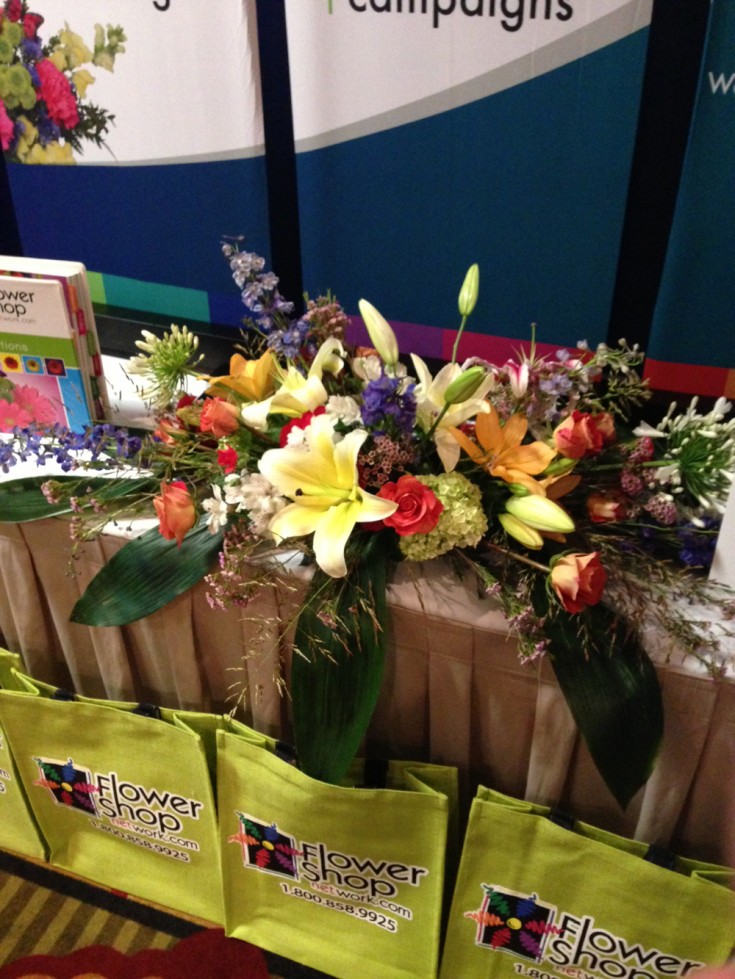 Beautiful booth arrangement by Flowers by Tommy, Lafayette LA