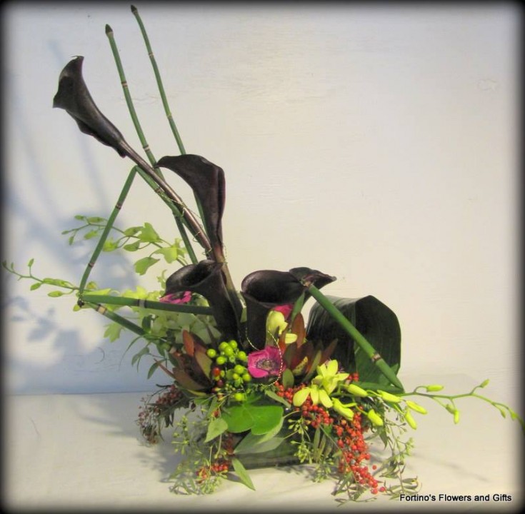 Elegant and creative arrangement from Fortino's Flowers and Gifts in Pontiac, MI