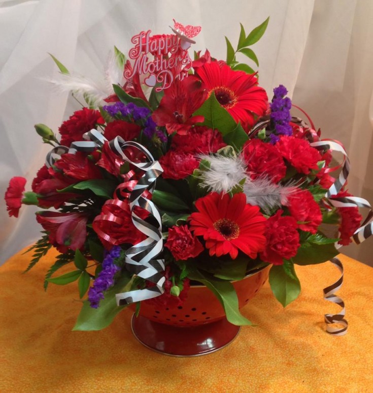 A one-of-a-kind floral display in a keepsake container from Michele's Floral and Gifts in Copperas Cove, TX