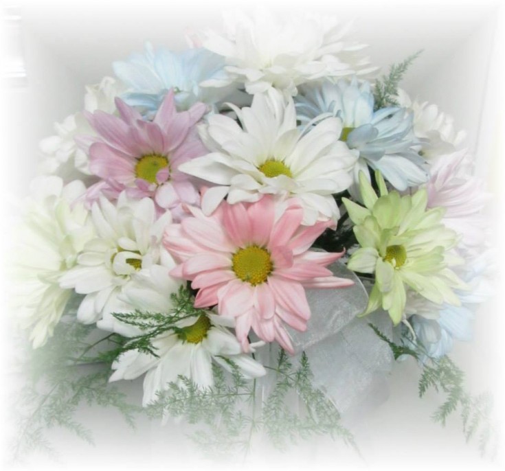 Pastel daisies making up this gorgeous wedding bouquet from Inspirations Floral Studio in Lock Haven, PA