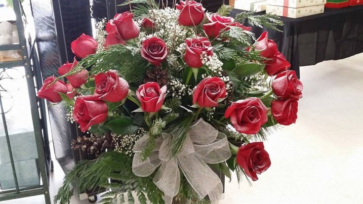 Snow-covered roses by Swannanoa Flower Shop in Swannanoa, NC